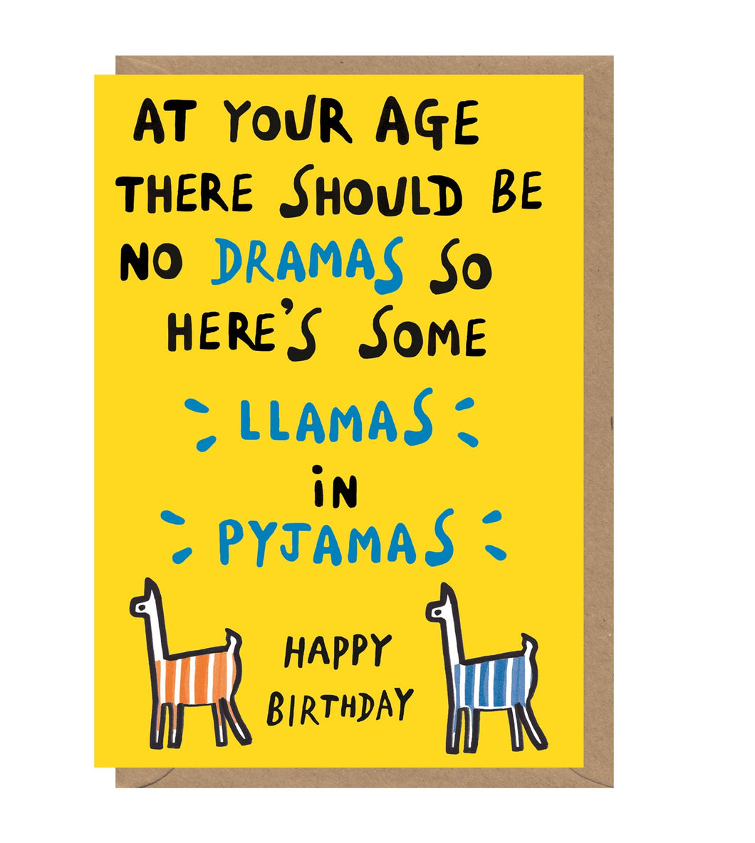 Neon yellow card with brown kraft envelope tucked inside. Card reads 'At your age there should be no dramas so here's some llamas in pyjamas, happy birthday'. Dramas, llamas and pyjamas are in blue, while the rest of the words are black. Two simple illustrations of llamas, one with orange stripes, the other blue stripes, are at the bottom of the card.