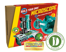 Load image into Gallery viewer, The Build Your Own Microscope box reads &#39;54 piece cardboard microscope kit, age 8 to adult, less plastic, no glue, no mess, no fuss &amp; 30x magnification&#39;. There are two awards superimposed on the photo. One award is Creative Play Awards 2020 Highly Commended, the other is Dad&#39;s Choice Awards 2020 Winner.
