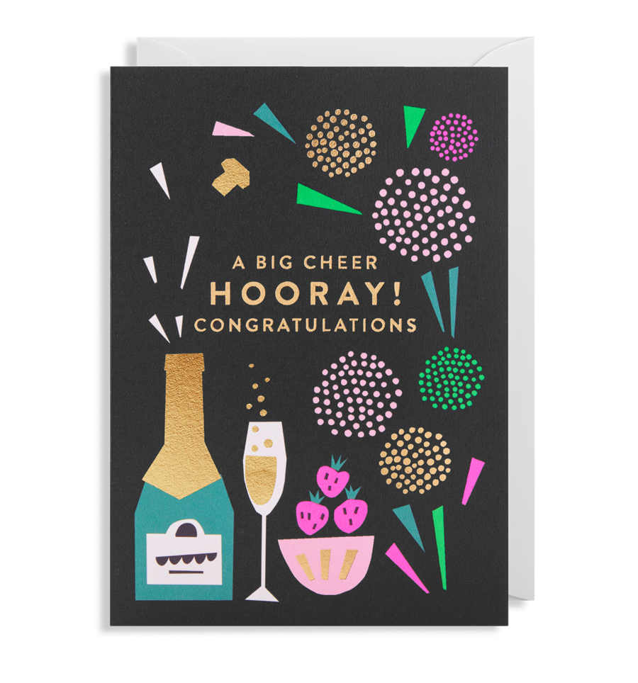 Black card with white envelope tucked inside. Colourful and occassionally foiled illustrations on the cover include fireworks, champagne bottle and glass, strawberries in a bowl. In capital letters and gold foil, the card reads 'A big cheer, Hooray! Congratulations'