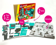 Load image into Gallery viewer, A picture of the Build Your Own Microscope Kit contents. Contents are 5 press out sheets, mirror, 2 lenses and instructions.
