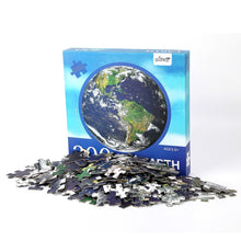 Load image into Gallery viewer, Earth puzzle box with puzzle pieces piled in front of it.
