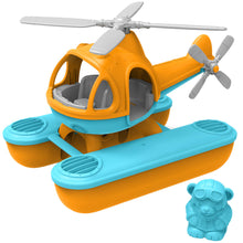 Load image into Gallery viewer, Orange and blue helicopter with 2 sea pontoons attached. A blue bear with an aviator costume is beside the seacopter.
