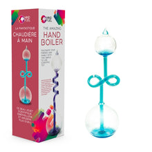 Load image into Gallery viewer, Red and white box with photo of hand boiler reads &quot;Mind Fuel The Amazing Hand Boiler. Fascinate your friends and family with this simple to use scientific toy.&quot; Beside the box is a hand boiler with blue liquid and an infinity symbol loop in the middle. 
