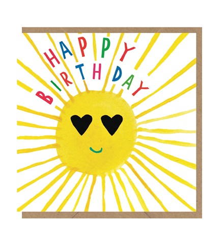 White card with brown kraft envelope tucked in. Card has an illustrated yellow sun with the rays reaching out to the edges of the card. The sun has black hearts for eyes and a small green smile. In between the rays it reads 'happy birthday' in capital letters in pink, blue and green.