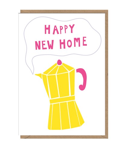 White card with brown kraft envelope tucked inside. An illustrated yellow coffee maker with pink accents has a steam cloud. Inside the steam cloud is written 'happy new home' in pink capital letters.
