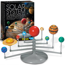 Load image into Gallery viewer, KidzLabs Solar System Planetarium Kit Box in left background with fully build planetarium model in foreground. Model itself is grey plastic, each of the planets and the Sun are painted. They all have a texture,.
