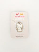 Load image into Gallery viewer, Pin badge is shaped like lab coat. Lab coat is white with pink flowers in the pocket &amp; pink buttons. Pin badge is attached to a backer that reads &#39;oh so science wooden pin badge&#39; and &#39;I&#39;m eco friendly&#39; with website &amp; social media details. 
