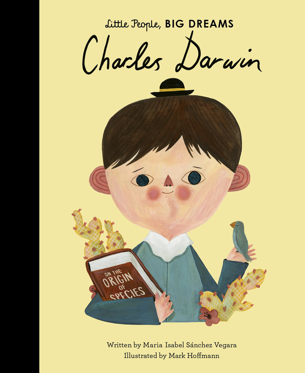 Book cover shows Charles Darwin (a white boy) with 'On The Origin of Species' in one arm while a blue bird sits on his palm. A tiny black hat sits on his head and there are cacti around him.