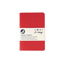 Load image into Gallery viewer, Red notebook with white band. Notebook has engraved &quot;make a mark&quot; at the top. The yellow band reads &quot;Vent for change, pocket journal, sustainable stationery with style. Notebook made using recycled leather and 100% sustainable paper.&quot;
