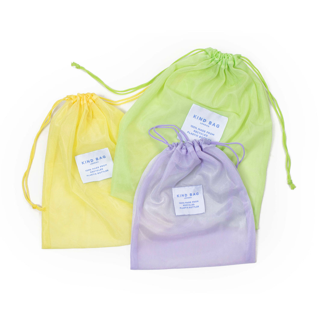 Three mesh bags: green is the biggest, yellow medium, and purple is the smallest. Each bag has a white label reading 