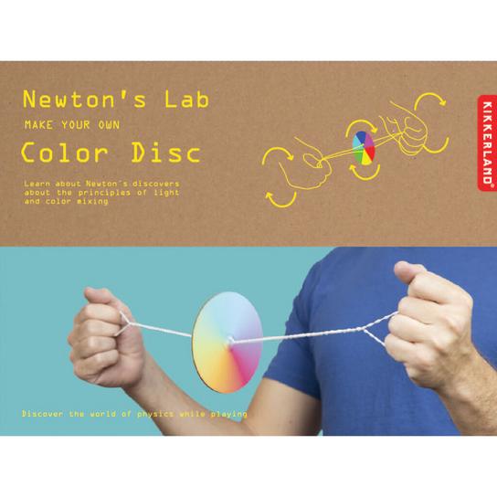 Packaging is brown kraft with photo of hands (a white man) spinning a colourful disc on string. Box reads 