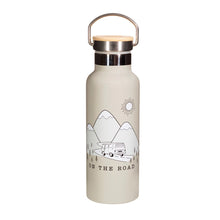 Load image into Gallery viewer, Grey water bottle with illustration of camper van driving on a road between mountains. Under illustration, &quot;on the road&quot; is written in black capital letters. The lid is on the bottle with the handle pointing upwards.
