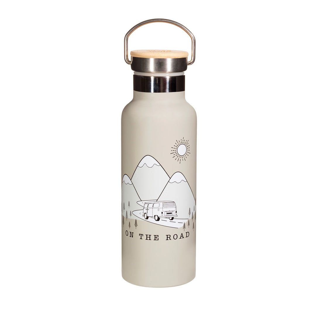 Grey water bottle with illustration of camper van driving on a road between mountains. Under illustration, 