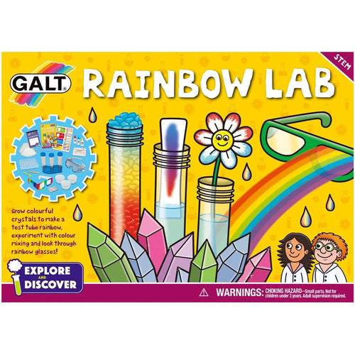 Rainbow Lab box is yellow with illustrations of test tubes, crystals, pair of glasses, and two children (medium-skinned girl with brown hair, ginger white boy) in lab coats. There is a small photo of box contents. Tagline in bottom left reads 