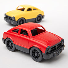 Load image into Gallery viewer, Close up of the red car with the yellow car in the background.
