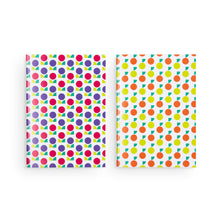 Load image into Gallery viewer, Two notebooks side by side. On the left is a notebook with purple and red flowers. On the right, the notebook design shows limes and mandarin oranges. 
