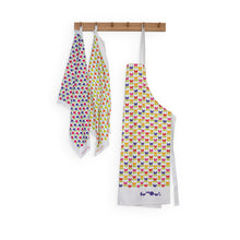 Load image into Gallery viewer, 2 tea towels and an apron hang from a wooden hook.
