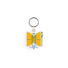 Load image into Gallery viewer, Keyring design shows a white, yellow and blue satellite with We The Curious logo to the side. 
