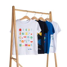 Load image into Gallery viewer, T-shirts with different designs hang on a rail with wooden hangers. Tshirts are in order: white alphabet, satellite, navy alphabet and cactus.
