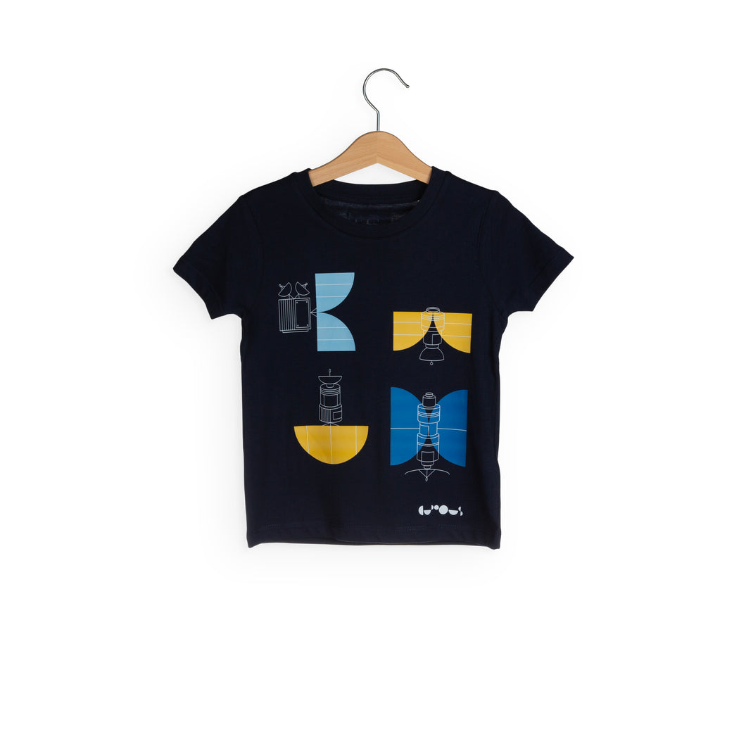 Dark blue t-shirt shows 4 different satellite designs in yellow and two different shades of blue. White We The Curious logo is in bottom right of t-shirt.