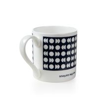 Load image into Gallery viewer, The other side of the mug shows same dark blue band and white moon phase designs. &quot;We The Curious&quot; is written upside down underneath the band. 

