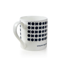 Load image into Gallery viewer, Mug from the other side shows the same pattern but underneath reads &quot;we the curious&quot; in dark blue, upside down. 
