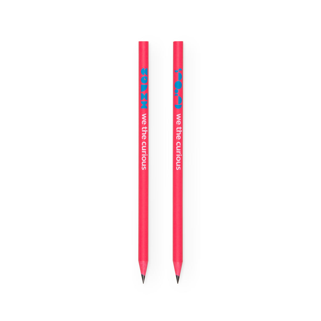2 pencils next to each other to show each side. Bright pink pencil shows blue We The Curious logo on one side, and blue characters on the other. Both sides show the name 