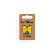 Load image into Gallery viewer, Blue and yellow satellite pin badge sits on a brown cardboard backer with We The Curious logo and the phrase &quot;pin badge&quot; below.
