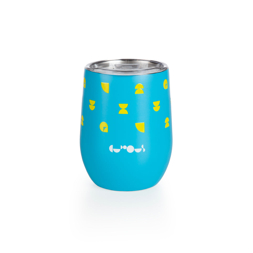 Travel mug is light blue with yellow pattern and white We The Curious logo. Lid is transparent. 
