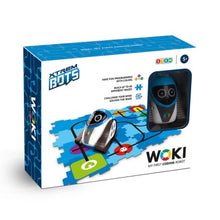 Load image into Gallery viewer, Woki box is white with blue accents. A small plastic window shows the Woki robot inside the box. The photo on the box is of Woki on the mat. The logo &#39;XTREM BOTS&#39; is in the top left.
